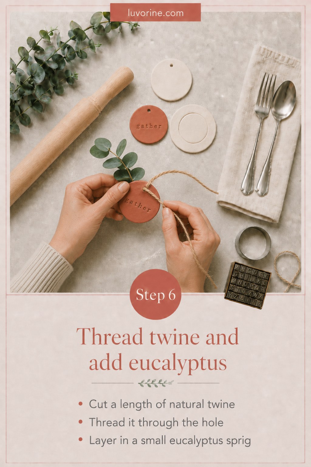 Threading natural twine through a clay tag and adding a sprig of eucalyptus