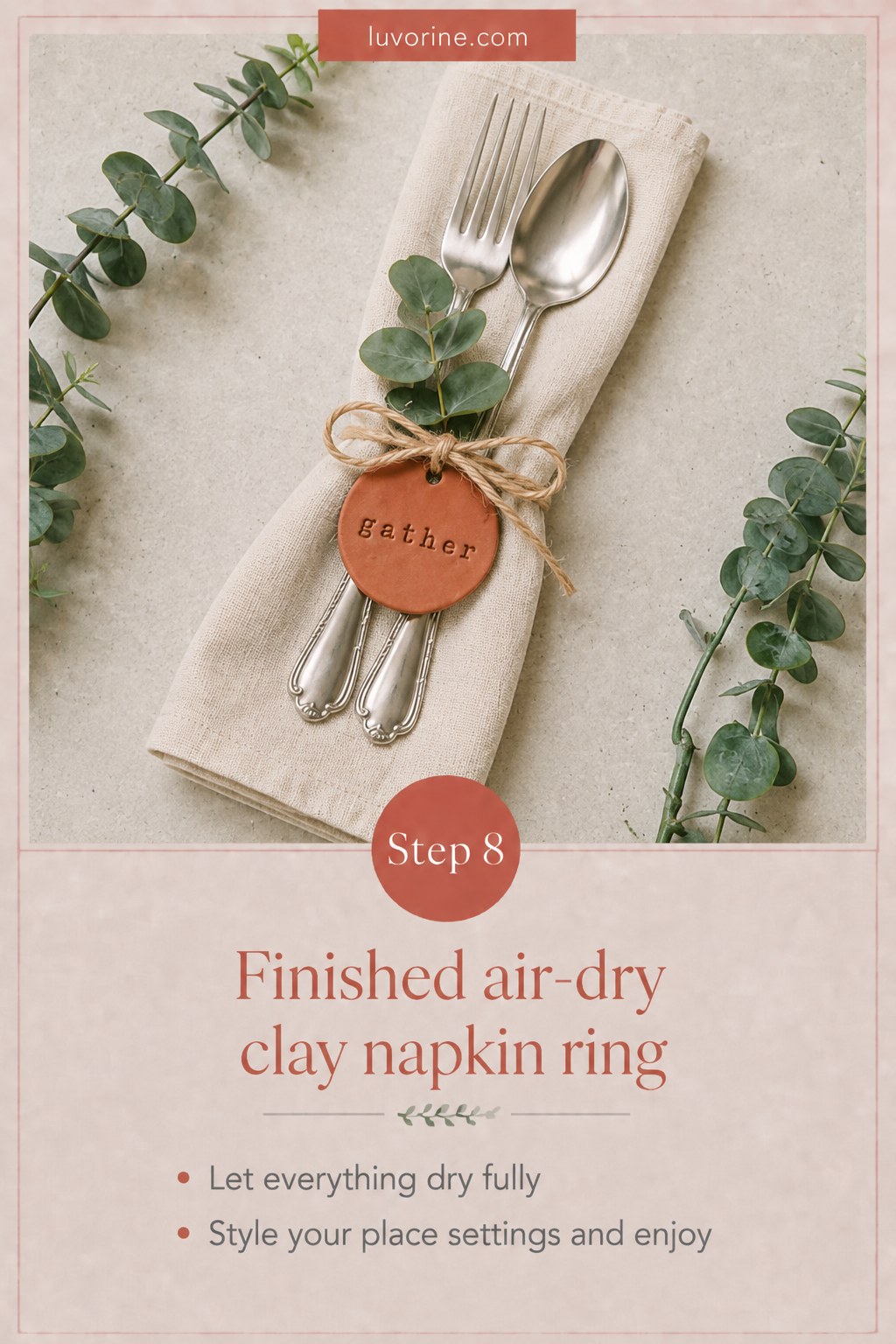 Finished air dry clay napkin ring styled on a table with eucalyptus greenery