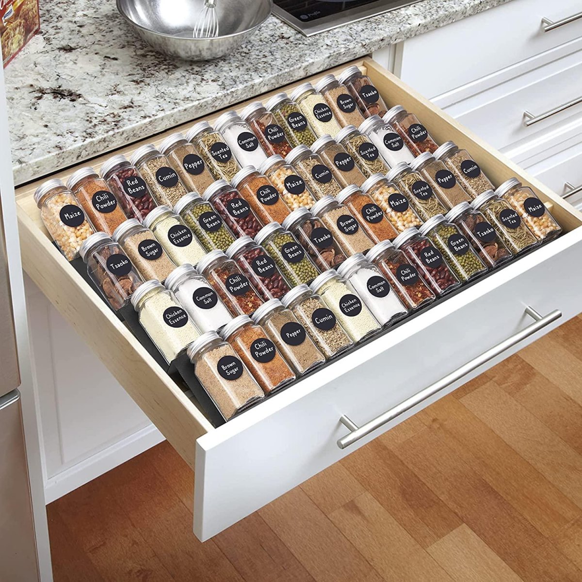 Spice jars organized in drawer