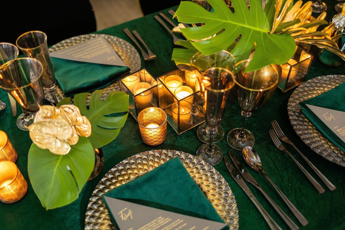 Emerald green gold tropical wedding decor