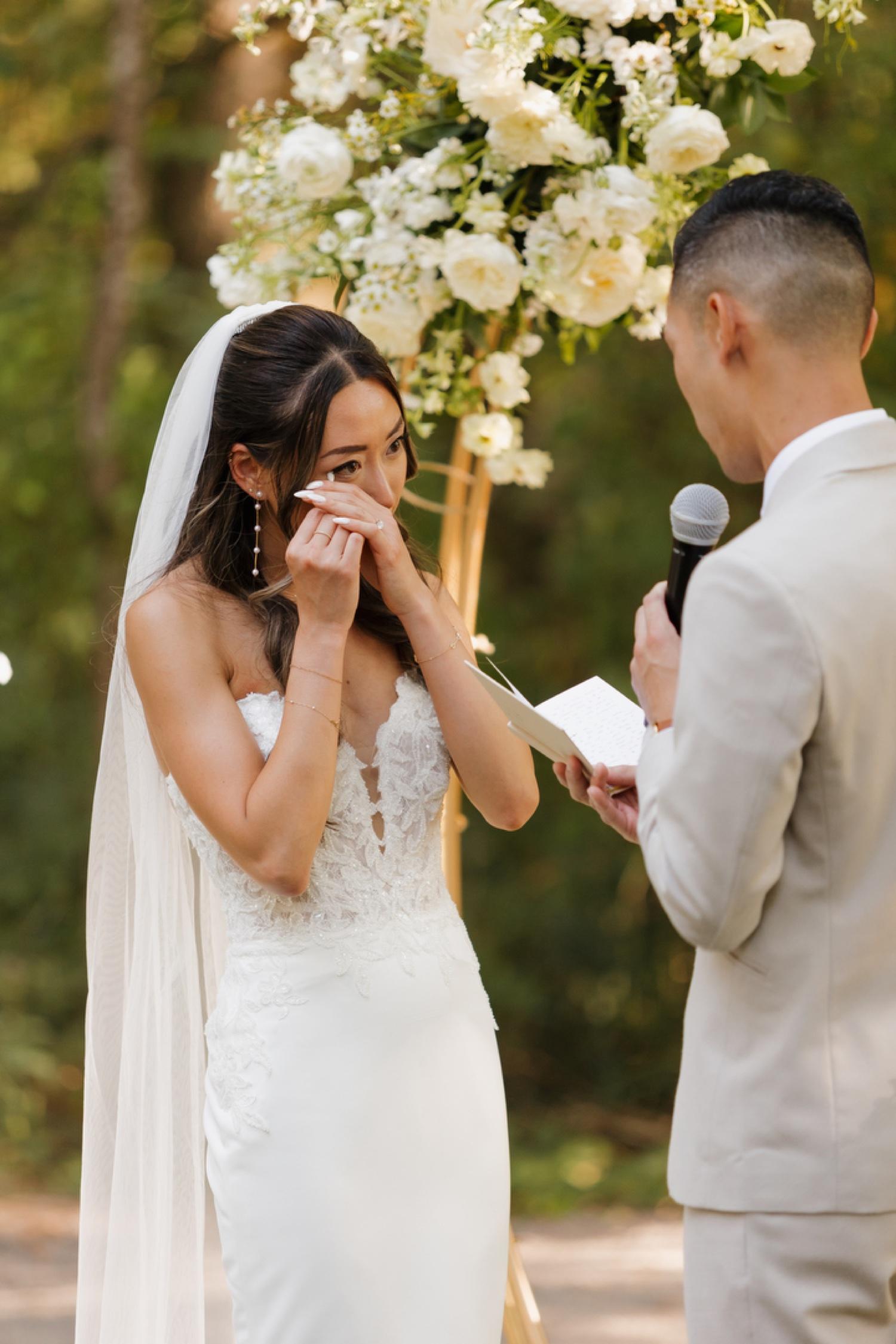 Emotional bride vow speech example during floral ceremony
