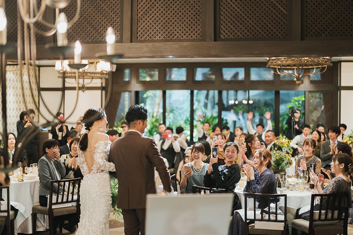 Couple thanking wedding guests