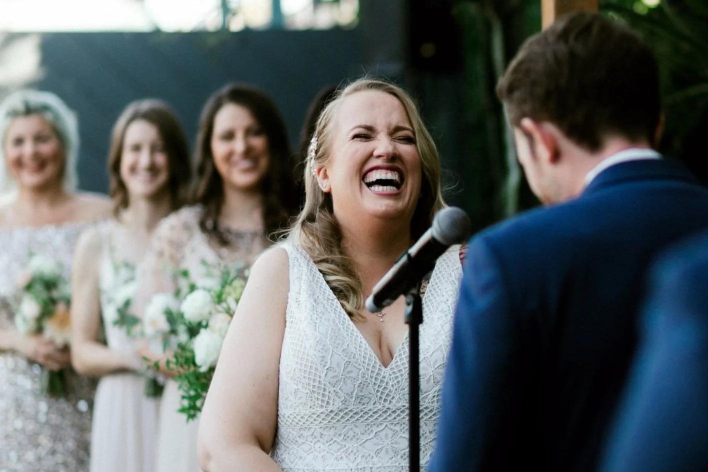 Funny bride vow speech example with joyful wedding laughter