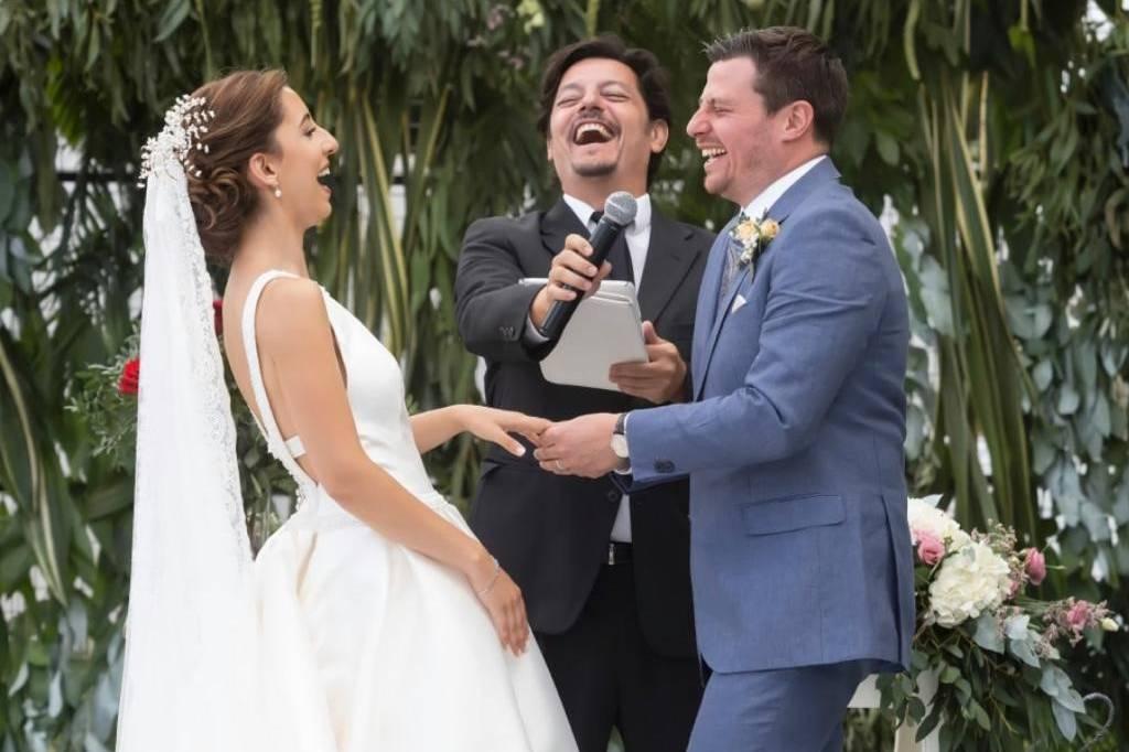Laughing couple during wedding ceremony