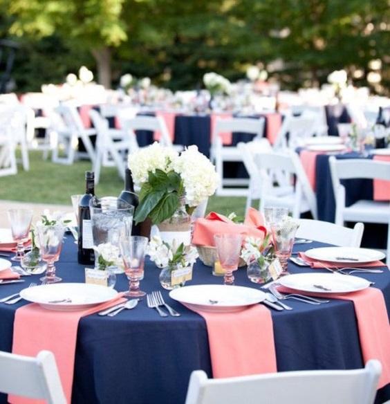Navy coral beach wedding setup