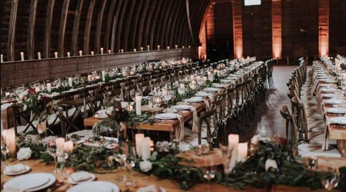 Rustic barn candlelit wedding reception
