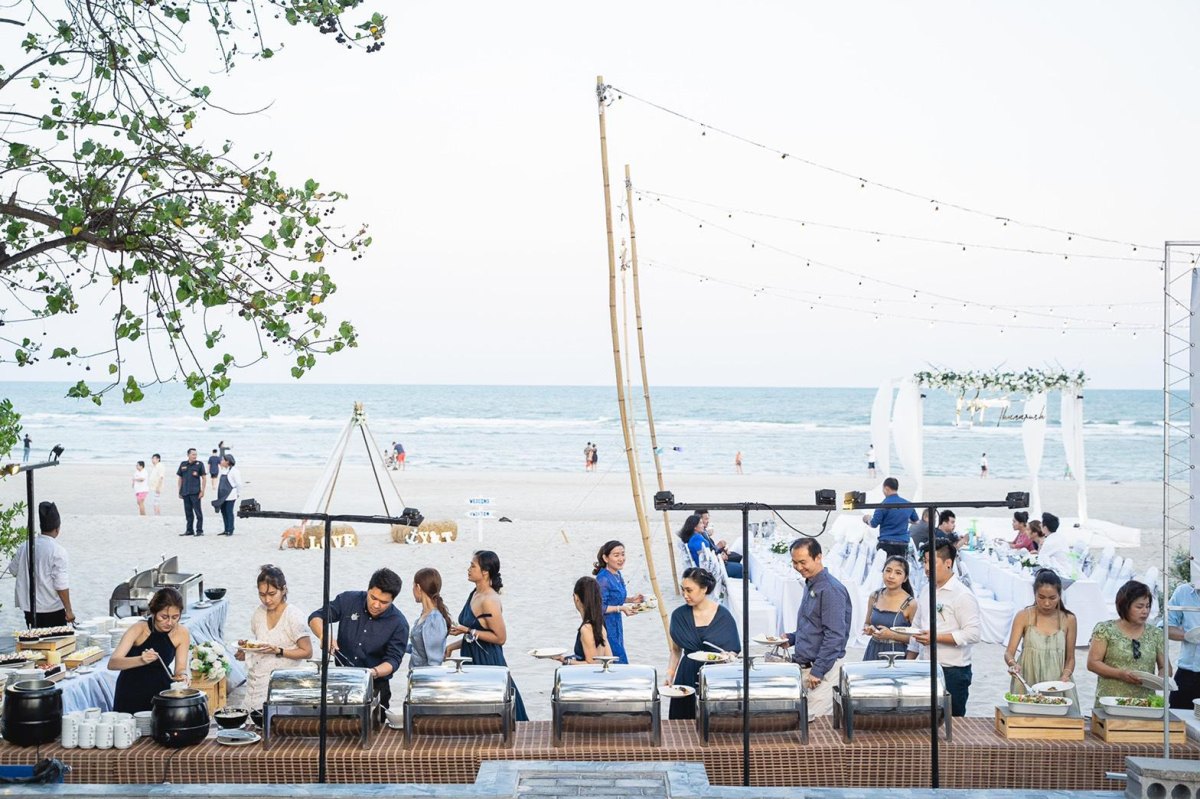 Casual beach wedding food reception setup
