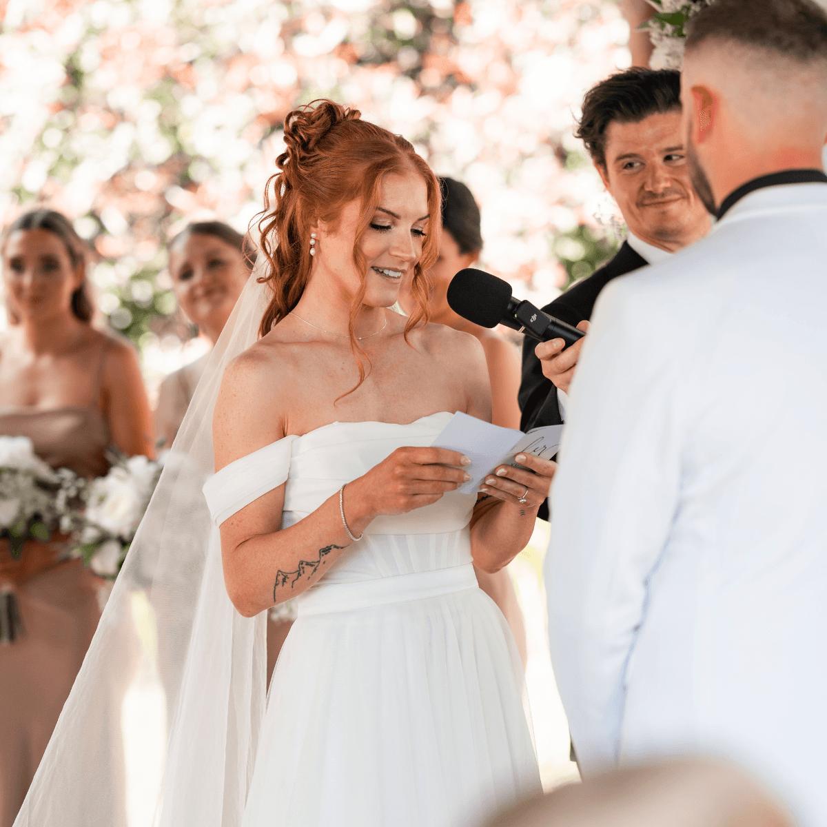 Bride reading short and sweet vow speech example at wedding