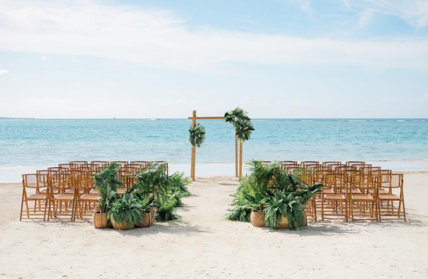 Local flowers and greenery beach wedding decor