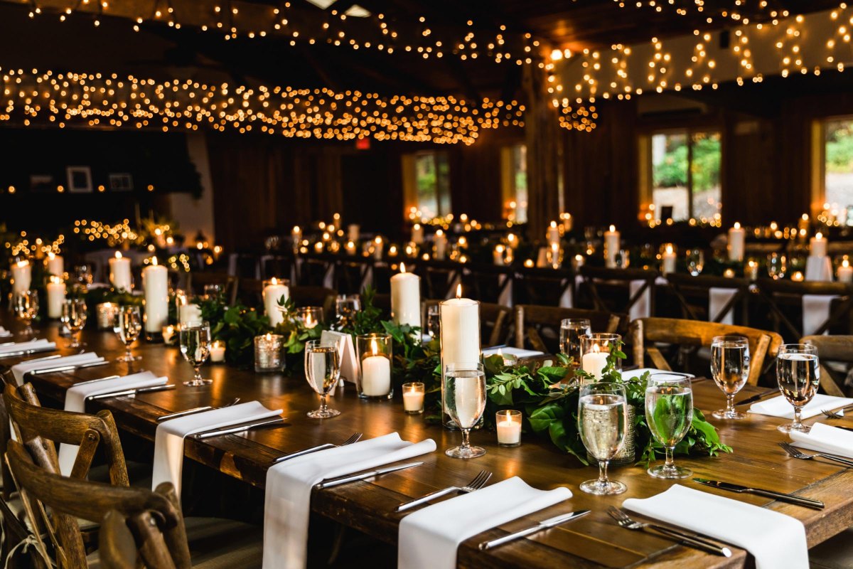 Candlelit earthy wedding reception tables